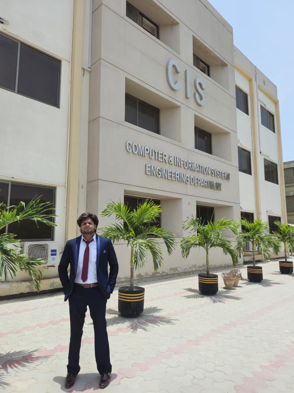Aaliyan in front of the Computer & Information Systems Engineering Department, NED University